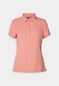 J.L Tour tech polo burnt coral.webp